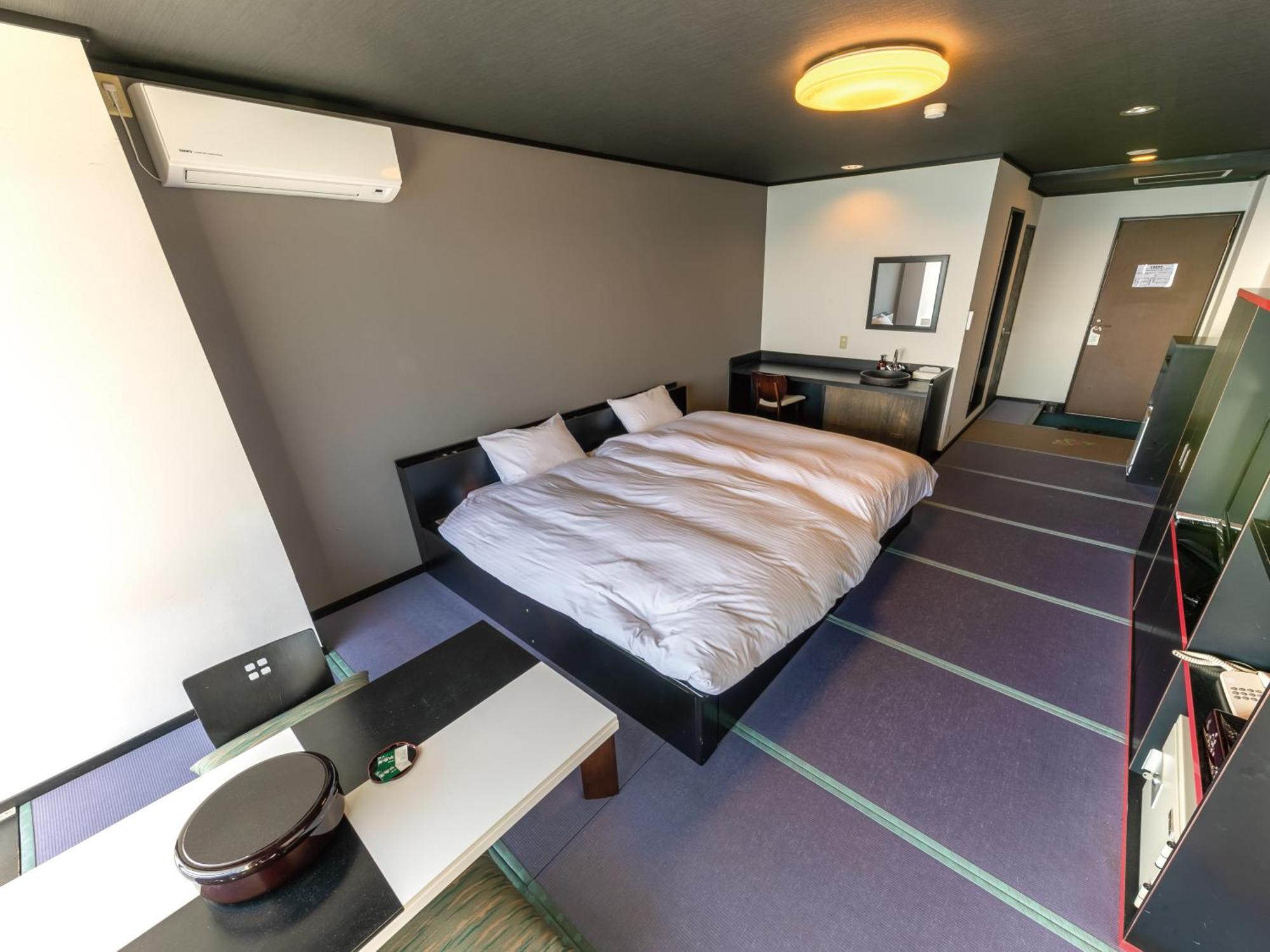 Apartamento estudio de 34 m² en Higashiizu, con 1 baño privado. Habitación foto