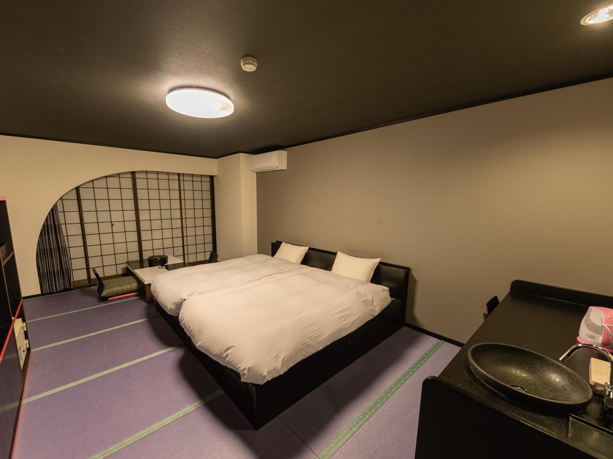 Apartamento estudio de 34 m² en Higashiizu, con 1 baño privado. Habitación foto